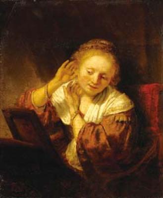 Young woman trying on earrings 1657