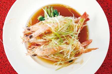 Steamed King prawns W. garlic $32