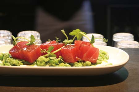 Tuna tartare with crushed green pea salad  $32