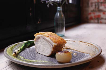 Pressed pork loin, sorrel puree, sherry chard, scallion and walnut