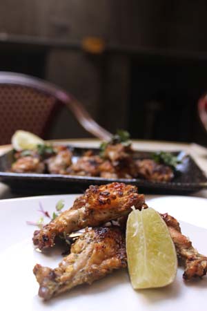Cuban spiced chicken ribs with grilled lime